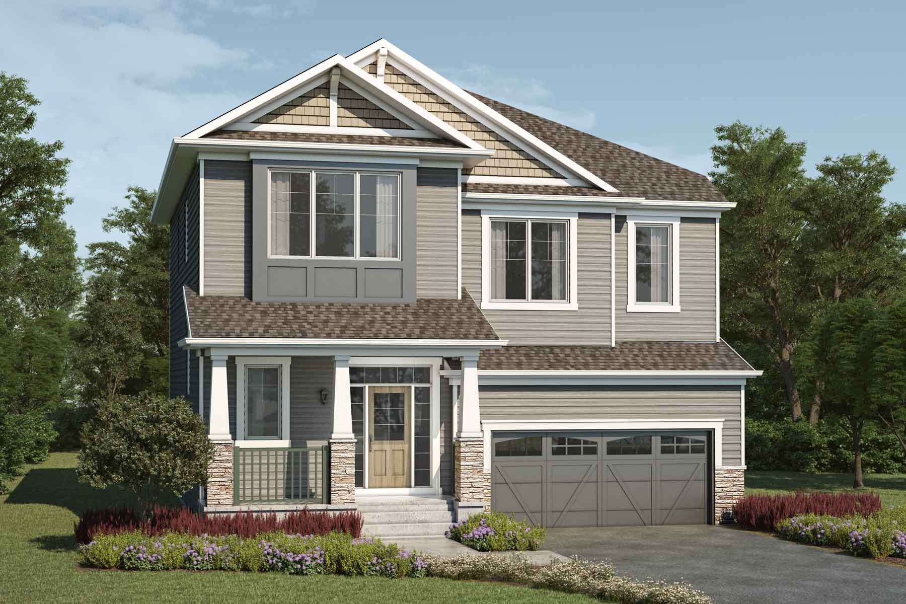 Craftsman style detached home with a double car garage.