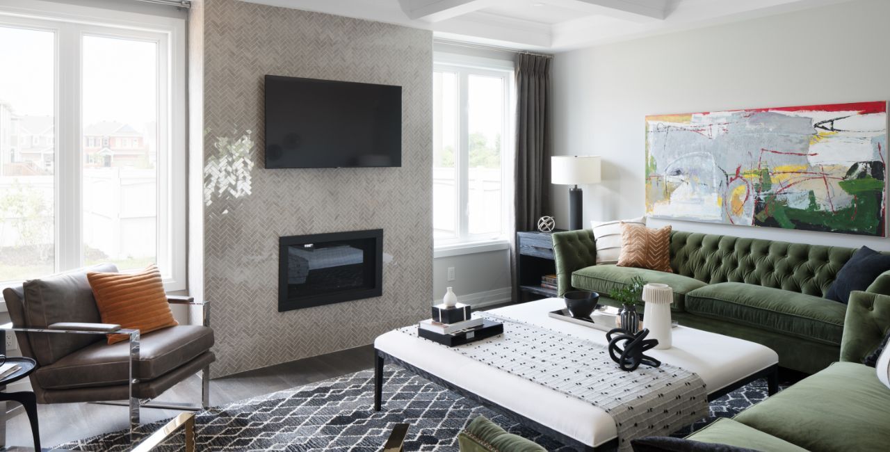 Living room with a wall mounted TV and fireplace