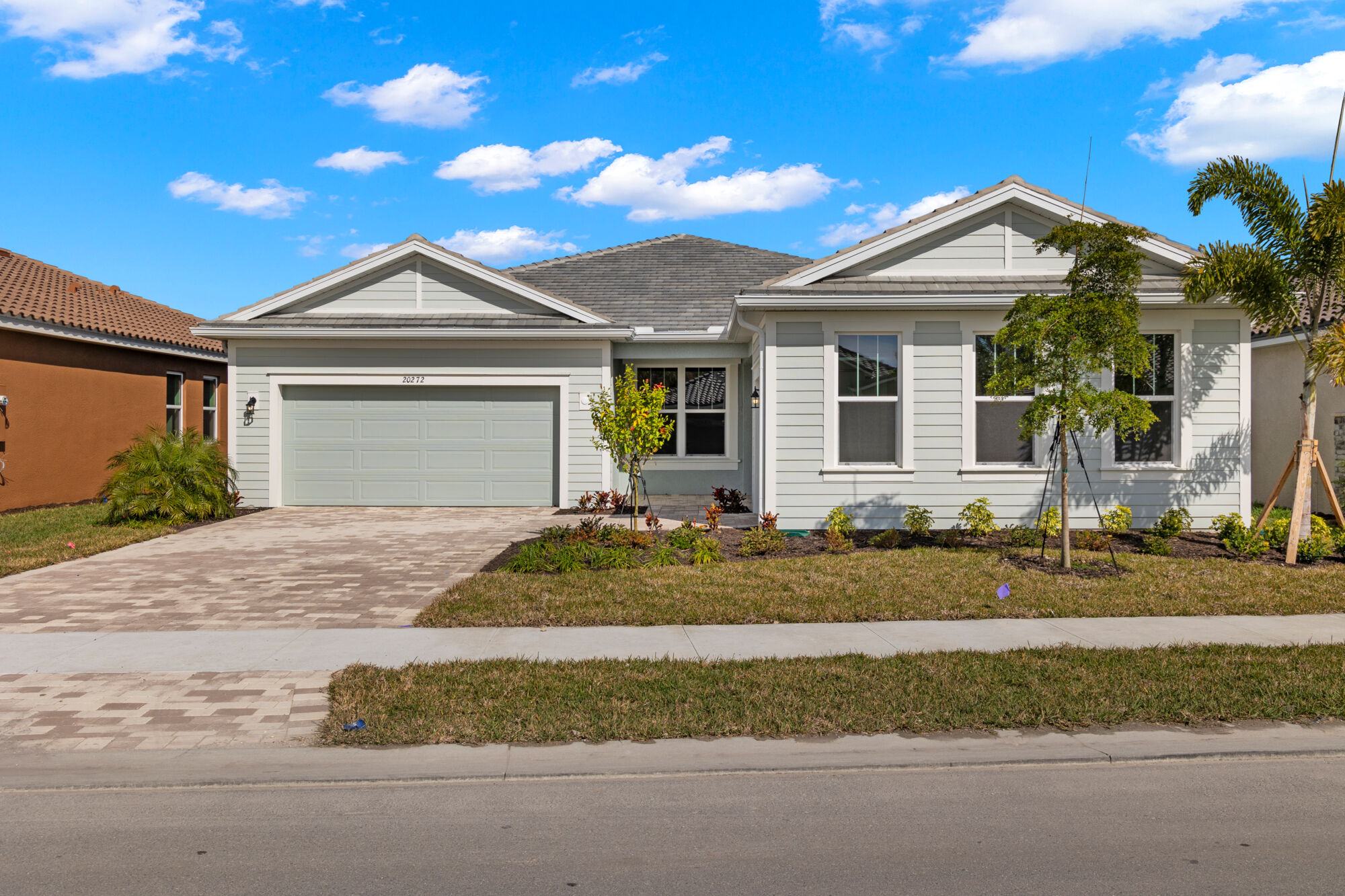 Water view lot, 3 bedroom, 2 bathroom, 3 car garage, Study, oversized owners shower, walk-in closet, breakfast bar on kitchen island, laundry room, walk-in pantry, front porch, open dining and Great Room, double 12' sliders, long covered lanai, 