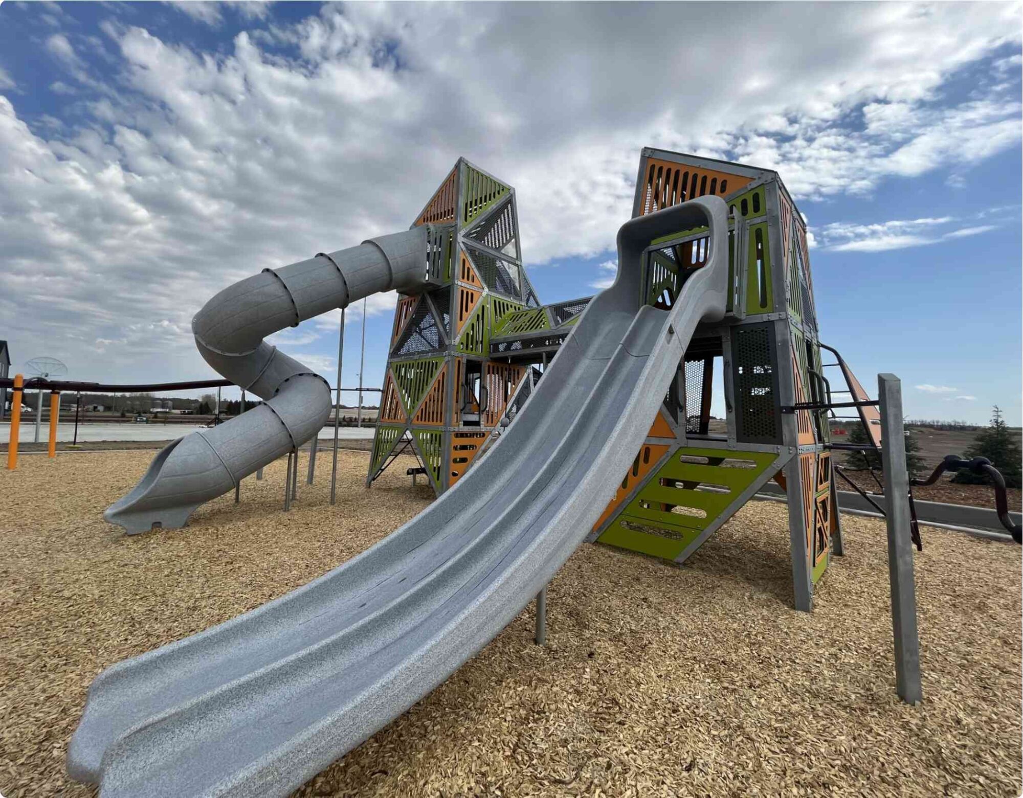 Playground amenity, slides, sky