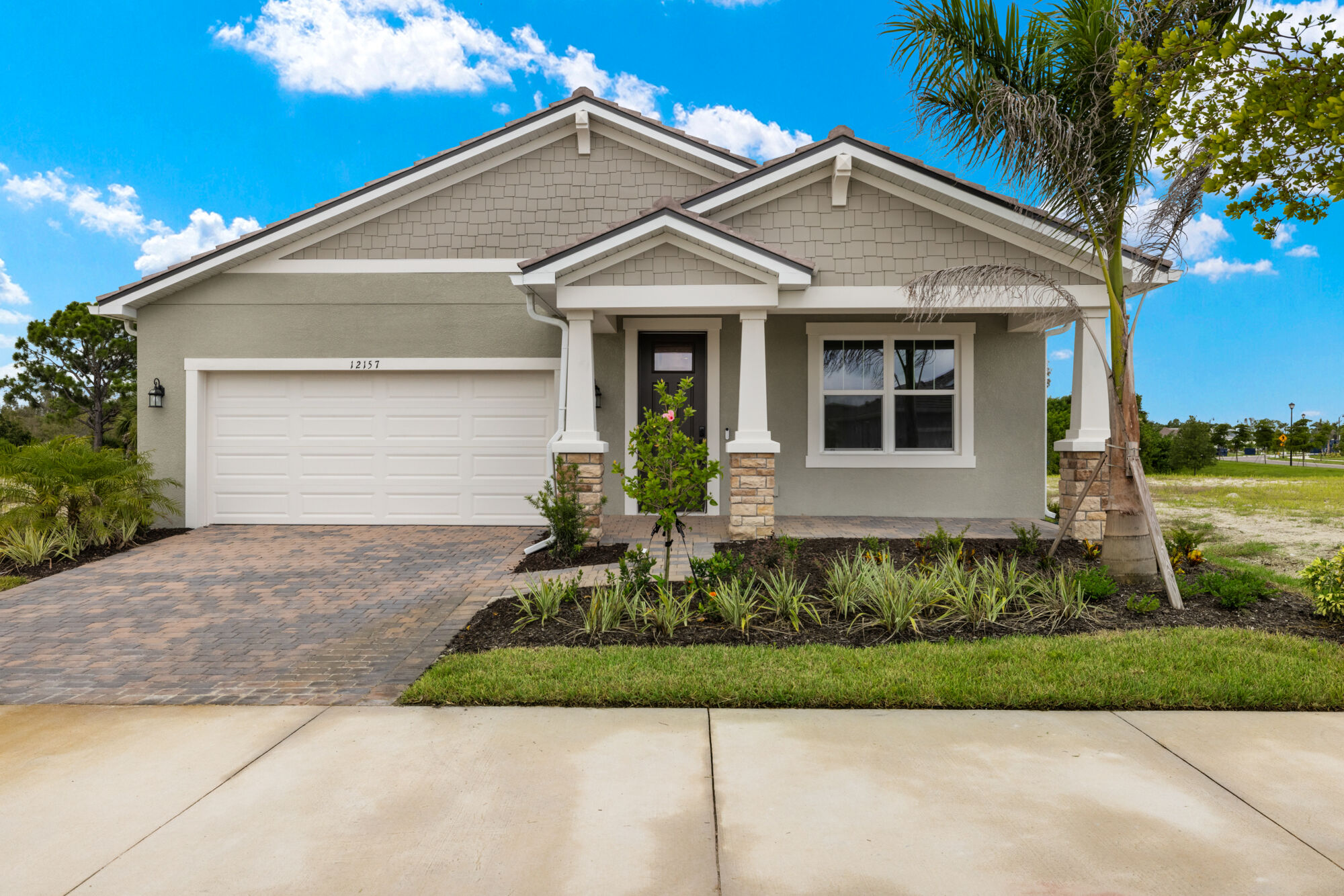 4 bedroom, 3 baths, open concept kitchen, dining and great room, executive kitchen, study, 2 car garage, covered lanai, split bedroom plan, luxury vinyl plank flooring, shaker style cabinets, Calacatta Ultra quartz countertops throughout the home, glass tile backsplash, pantry, 