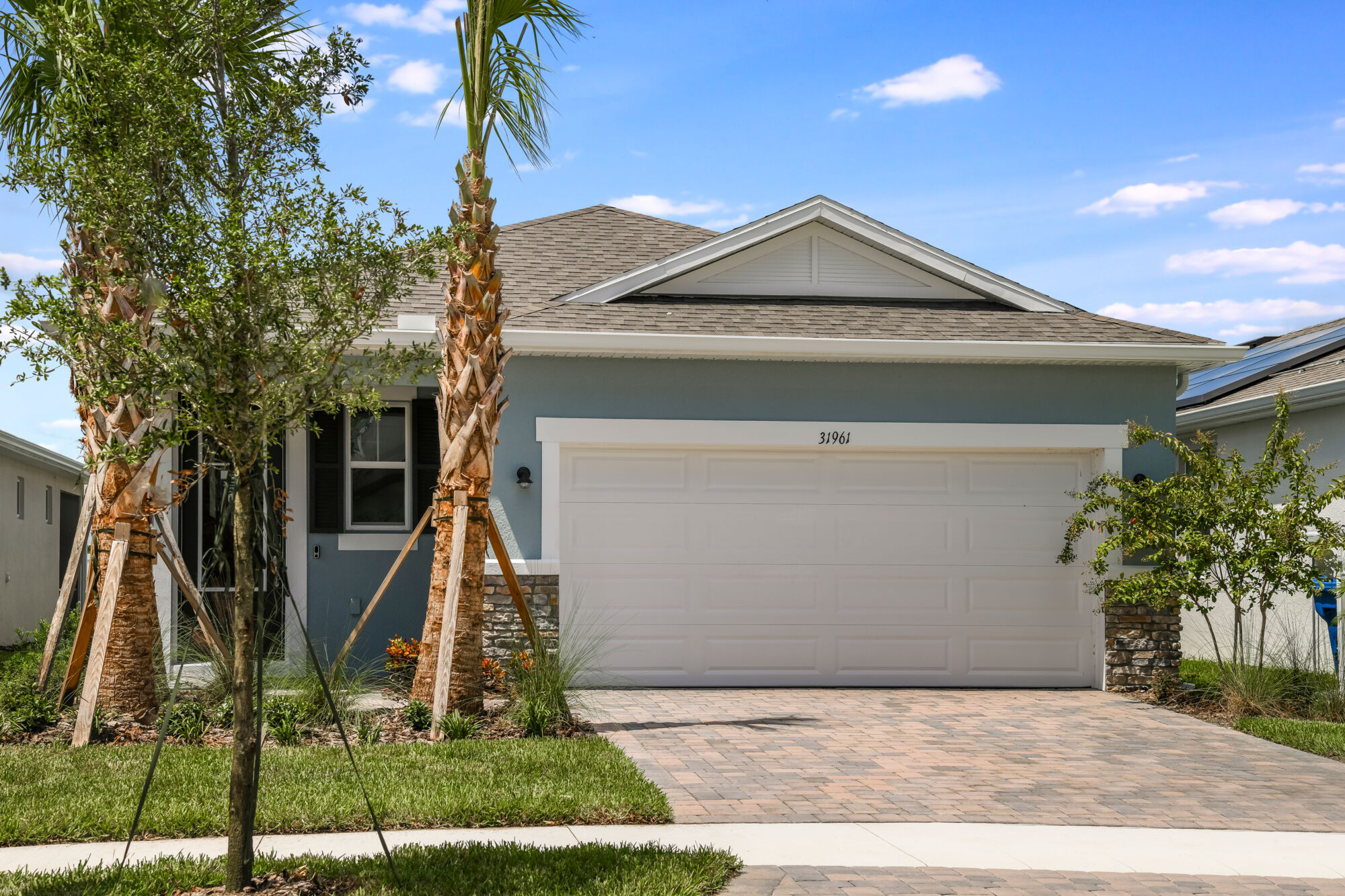 3 bedroom, 2 baths, 2-car garage, open floor plan, breakfast bar, split vanities, pantry, oversized slider, walk-in closet, luxury vinyl plank flooring, covered lanai