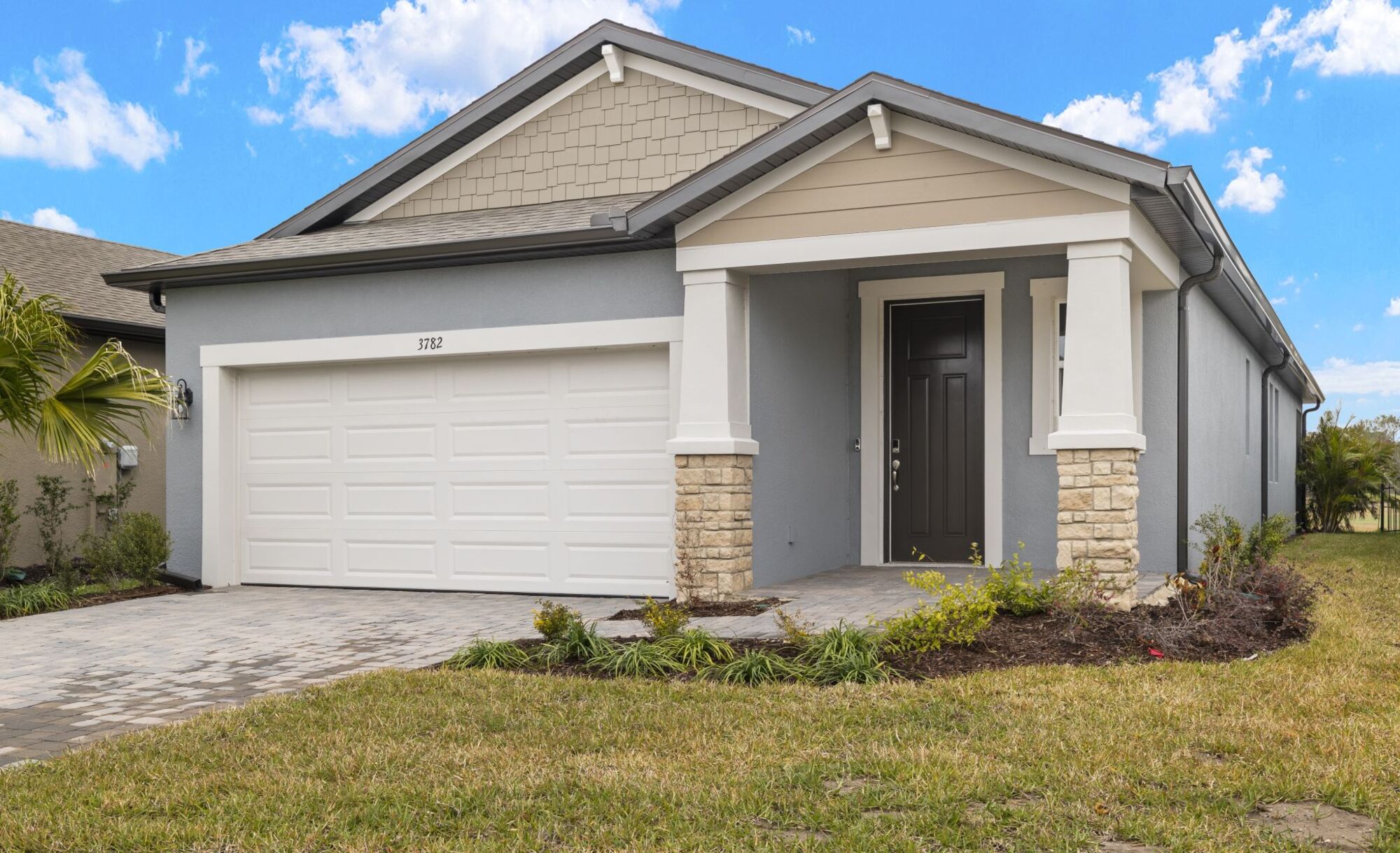 craftsman exterior, paver drive, cedar shake, stone