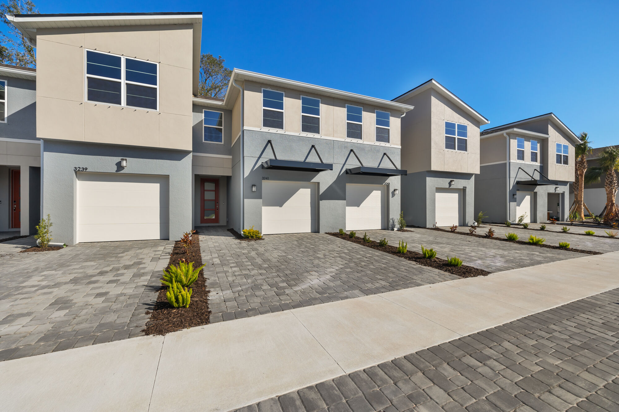  Town Homes with garage, window and door