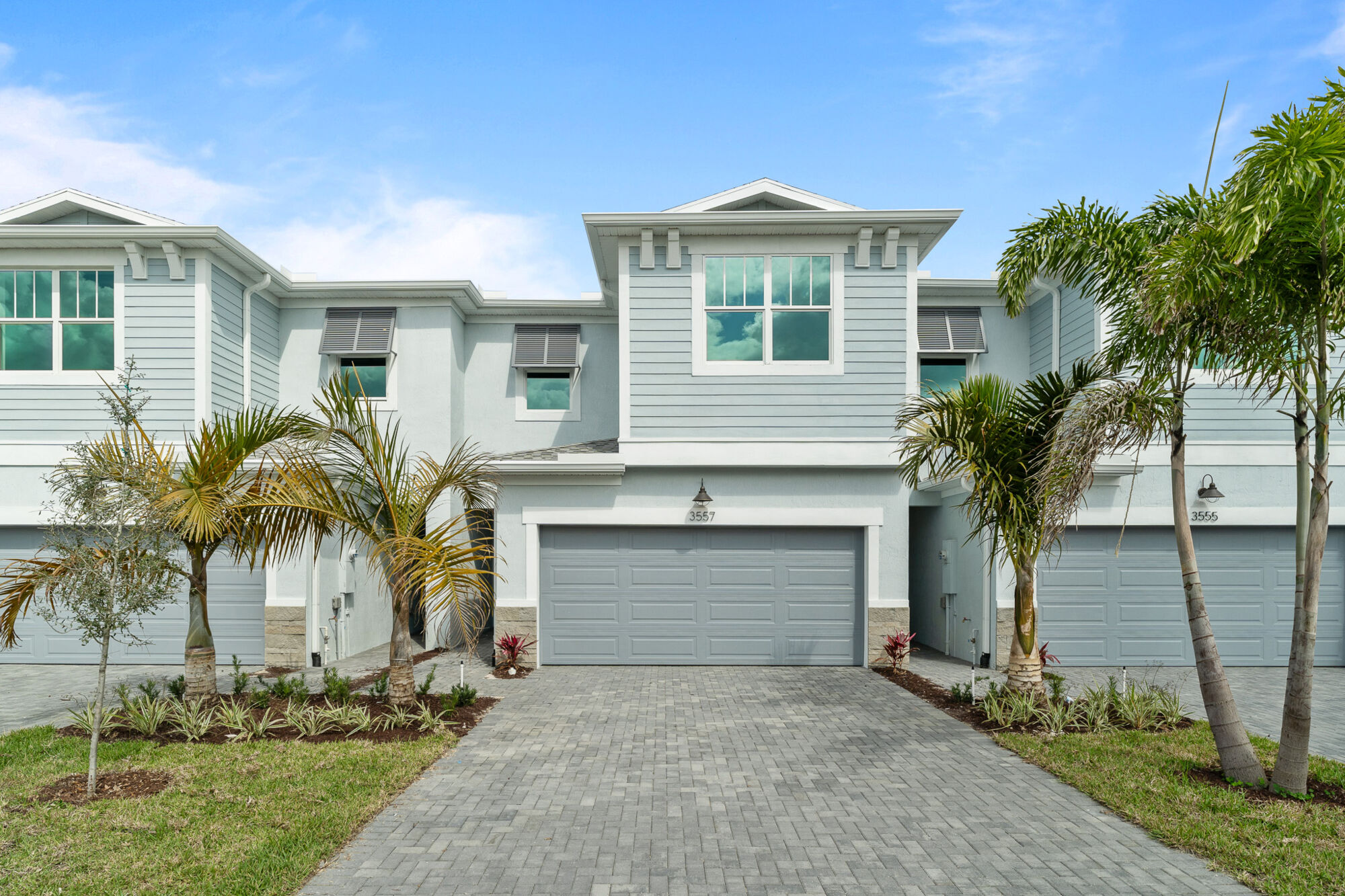  Elevation Front with garage, window and exterior clapboard