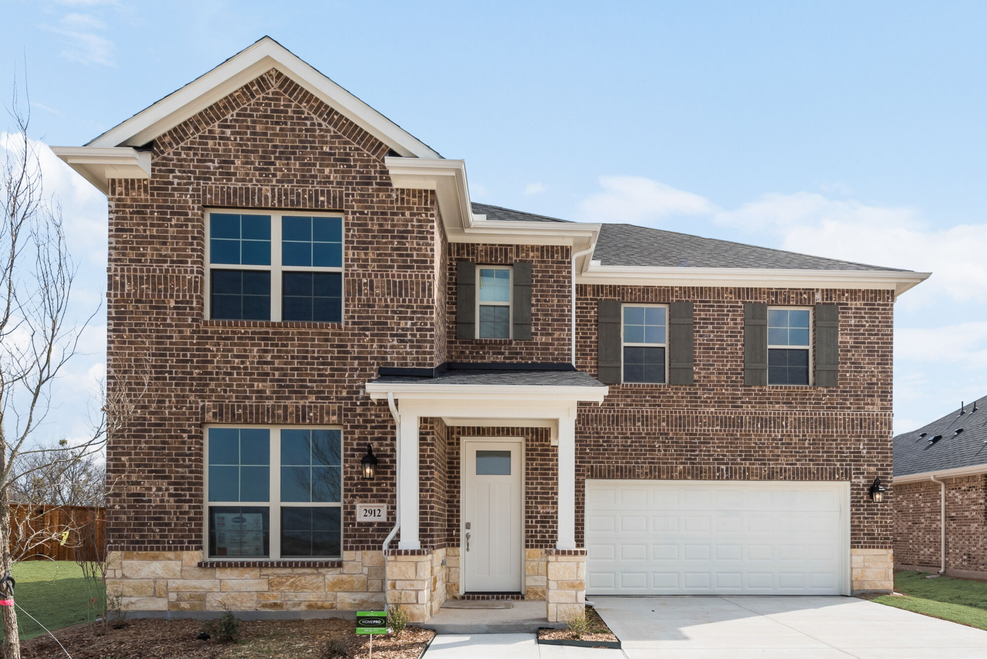 Elevation Front with window, garage and door